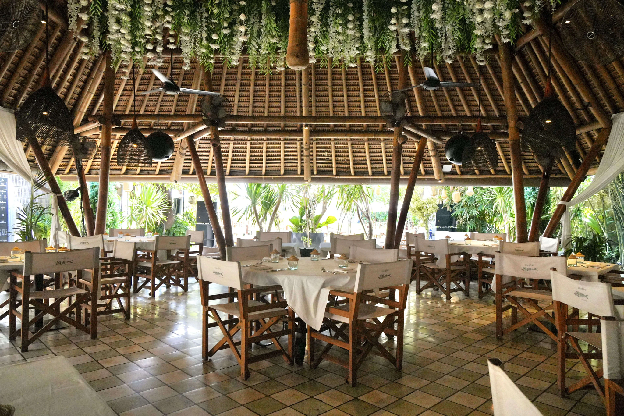 Open-air bamboo dining space at Sardine, a fun place to eat with kids and family in Seminyak